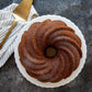 Fantastische Nordicware Swirl Aluguss Backform